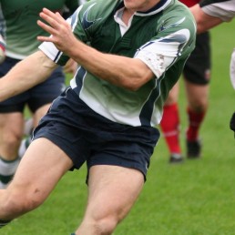 Rugby man receiving ball
